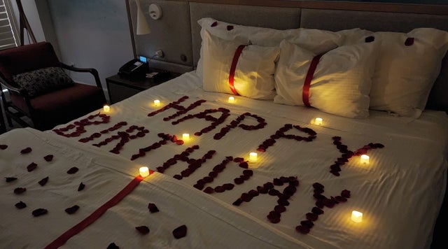 Rose Petals on the Bed.